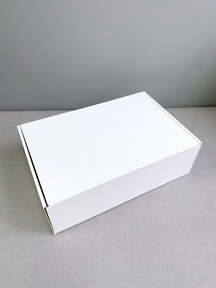 Коробка из гофоркартона, 32х22х10 см. белая